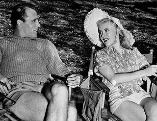 Ralph Bellamy met Ginger Rogers op de filmset van "Carefree" (1938)