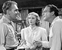 In Crime of Dr. Hallet (1938) speelden twee toekomstige Ellery Queens tegenover elkaar. Ralph Bellamy (L) in een discussie met William Gargan (R). Josephine Hutchinson kijkt toe.