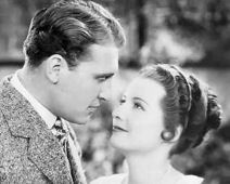 In "Forbidden" (Columbia Pictures, 1932) speelt Ralph Bellamy de Daily Record city uitgever Al Holland tegenover Barbara Stanwyck.