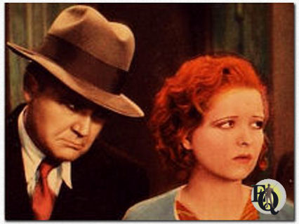 Wade Boteler (L) with Clara Bow in "Kick In" (1931)