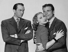 Joan Blondell, Dick Powell en Lee Bowman in en publiciteitsfoto voor "Model Wife" (1948).