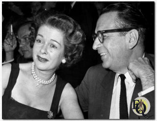 Candid picture of Joan Bennett and Donald Cook both guests at a recent Palace Theater party following the premiere of "Pillow Talk" (Oct 19, 1959)