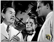 Er kwam nog een tweede Chan filmrol in "Castle in the Desert" (1942). (Van L naar R): Sidney Toler als Chan, Henry Daniell en Richard Derr. 