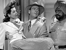 Irene Hervey with William Gargan in the Universal's mystery "Bombay Clipper" (1942).