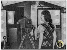 "Miss Television 1938" posing in front of a camera - note the amount of lighting required! 