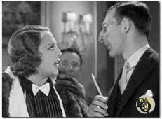 Bebe Daniels als Dorothy Brock en Charles Lane als auteur van "Pretty Lady" in "42nd Street" uit 1933.