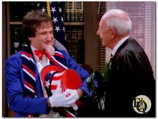 Robin Williams (L) as Mork opposite Charles Lane as Judge Baker in a "Mork and Mindy" episode called "Little Orphan Morkie" (1980).