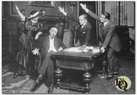 Publicity photographs, like this one for "It Pays to Advertise", usually relied on pictures from professional productions, often from New York, and gave Circuit audiences little indication of what the production they would see actually looked like. Iowa. Ed Latimer is possibly the second from the right.