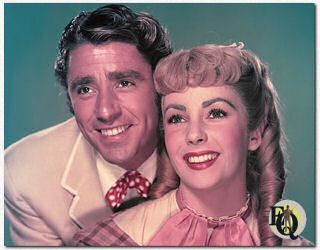 1949 Peter Lawford and Elizabeth Taylor in a publicity shot for "Little Women".