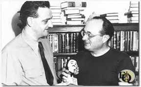 Lee receives an Edgar Award for the Ellery Queen radio show from Edward S. Sullivan, President of the Southern California chapter of Mystery Writers of America.  (Photo courtesy Rand B. Lee)