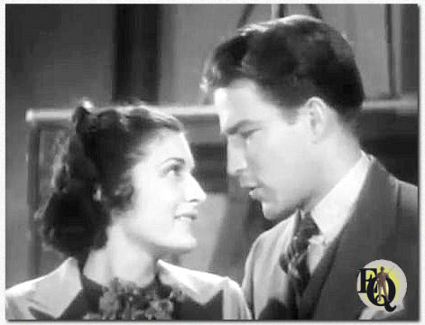 "It Couldn’t Have Happened (But It Did)" (1936) Evelyn Brent als Beverly kijkt Edward (Hugh Marlowe) met grote ogen aan.