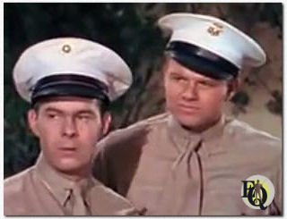 Morgan (L) maakte zijn debuut op het grote scherm (aanvankelijk onder de naam "Henry Morgan") als acteur onder contract in de film uit 1942 "To the Shores of Tripoli."