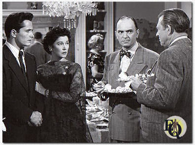 (L-R) John Derek, Erin O'Brien-Moore, Santos Ortega, Carl Benton Reid in de film "The Family Secret" (1951).