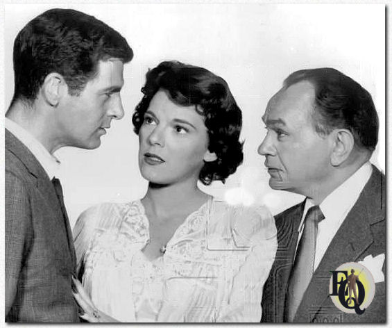 A moral issue involving the future of their textile mills and thousand of employees forces a head-on clash between father, Edward G. Robinson (R), and son, Lee Philips (L), in "A Good Name," seen on "Goodyear Theater" (NBC, Mar 2. 1959). Jacqueline Scott sides with her father-in-law against her husband in dispute.