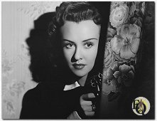 Margaret Lindsay als Nikki Porter in "A Close Call for Ellery Queen" (1942).