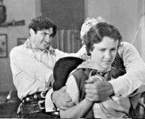 In a Tom Mix Production from 1932 "Fourth Horseman" Margaret Lindsay is trying to fight of some men