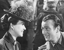 John Wayne en Margaret Lindsay in "The Spoilers"  (1942).