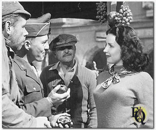 Tom Ewell, David Wayne en Marina Berti schitteren in de WO II film "Up Front" (Universal, 5 maa 1951).