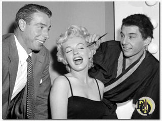 Joe DiMaggio and Marilyn Monroe pay a backstage visit (1954) to David Wayne during a performance of "The Teahouse of the August Moon" (Martin Beck Theatre, Oct 15, 1953 - Mar 24, 1956).