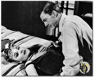  Wayne portretteerde de schizofrene Joanne Woodward's lang lijdende echtgenoot in "Three Faces of Eve" (1957).