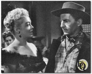 Myrna Dell en David Wayne in "The Naked Hills" (1956). 