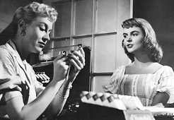 As Clara Madison in "Portland Expose" (1957) with Carolyn Craig.
