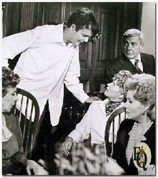 Carmen Mathews, Jim Hutton, Julie Sommars, Rhonda Fleming and David Wayne during the episode 'The Adventure Of The Mad Tea Party'. 