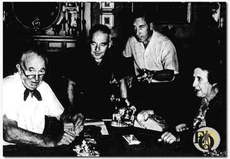 Producer Irving Pincus (pointing) and director Charles Barton rehearse Walter Brennan and guest star Minerva Urecal during The Real McCoys episode "The Gigolo" (Nov 10. 1960). In the episode, Amos, hoping to avoid foreclosure, courts the elderly spinster who holds the mortgage on the McCoy farm. (The Washington Post, Dec 4. 1960)