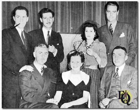 The cast of "The Shadow" (seated L to R): The Shadow (played by Bill Johnstone), Margot Lane (Marjorie Anderson), Weston (Artur Vinton). Standing: Shrevie (Keenan Wynn), announcer Ken Roberts, organist Elsie Thompson, director Wilson Tuttle ("Movie Radio Guide", Dec 14. 1940)