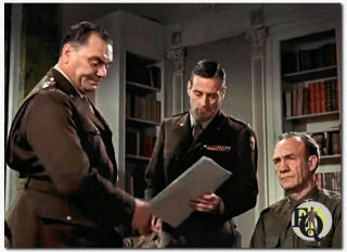 Sullivan appeared uncredited in a briefing in The Dirty Dozen (1967). (L to R) Lee Marvin, Ernest Borgnine, Robert Webber, Elliott Sullivan.