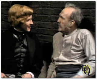 In Edward the Seventh (1975) Charles Sturidge as young Edward talking to a prisoner, played by Elliott Sullivan.