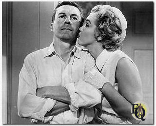 Wayne with Marilyn Monroe in  "We're Not Married" (1952).
