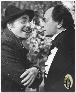 David Wayne (L) and Edward G. Robinson (R) in a scene for "The Devil and Daniel Webster," Stephen Vincent Benet's classic which was presented on NBC-TV Sunday, Feb 14. Wayne plays the part of the cheerful Devil. Robinson is Webster, who helps a farmer friend after he sells his soul to the Devil. This was one of Robinson's rare television appearances.
